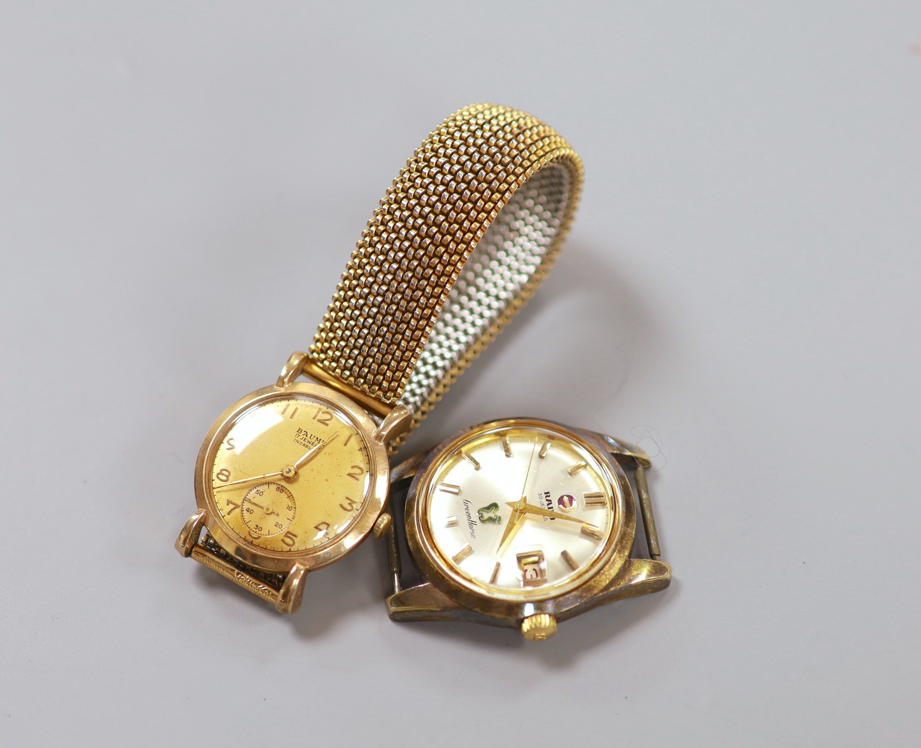 A gentleman's 9ct gold Baume manual wind wrist watch, on a gilt metal flexible strap and a gentleman's steel Rado Gren Horse wrist watch, no strap.